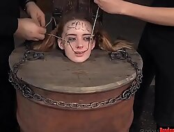 Bdsm babe trapped in a barrel and electrified